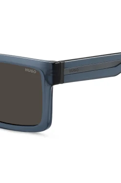 Transparent-blue sunglasses with grey lenses