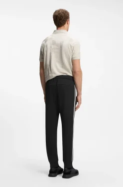Triangle-jacquard tracksuit bottoms with rubberised logo