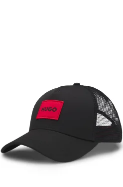Twill trucker cap with red logo label
