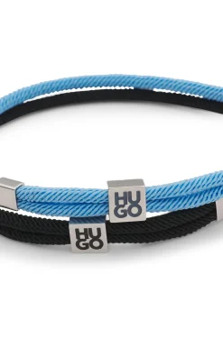 Two-pack of cord cuffs with logo plaques