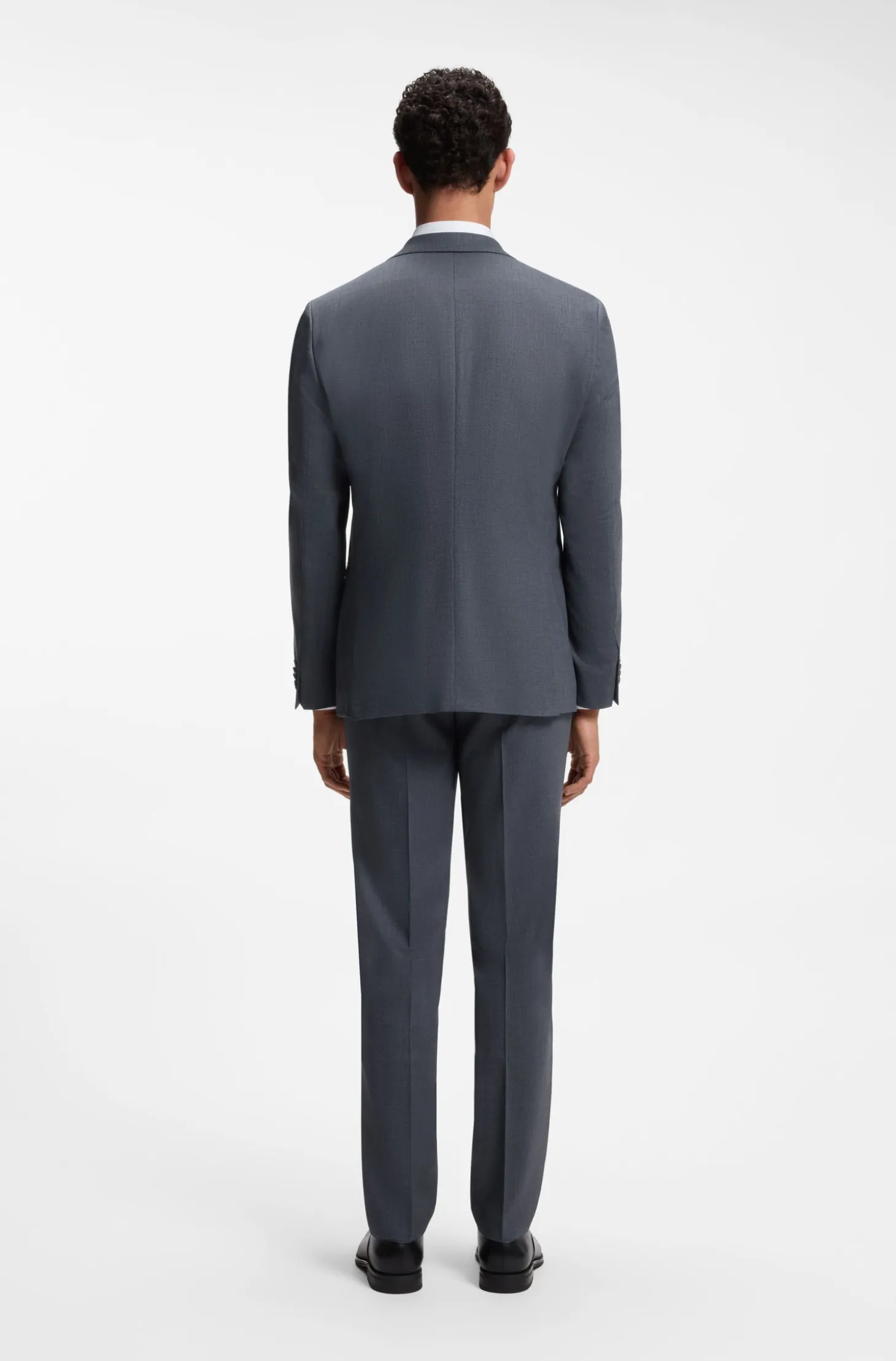 Two-piece suit in micro-patterned stretch fabric