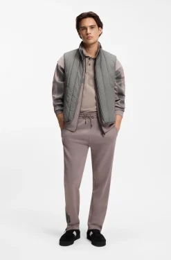 Vertical-quilted gilet with logo detail