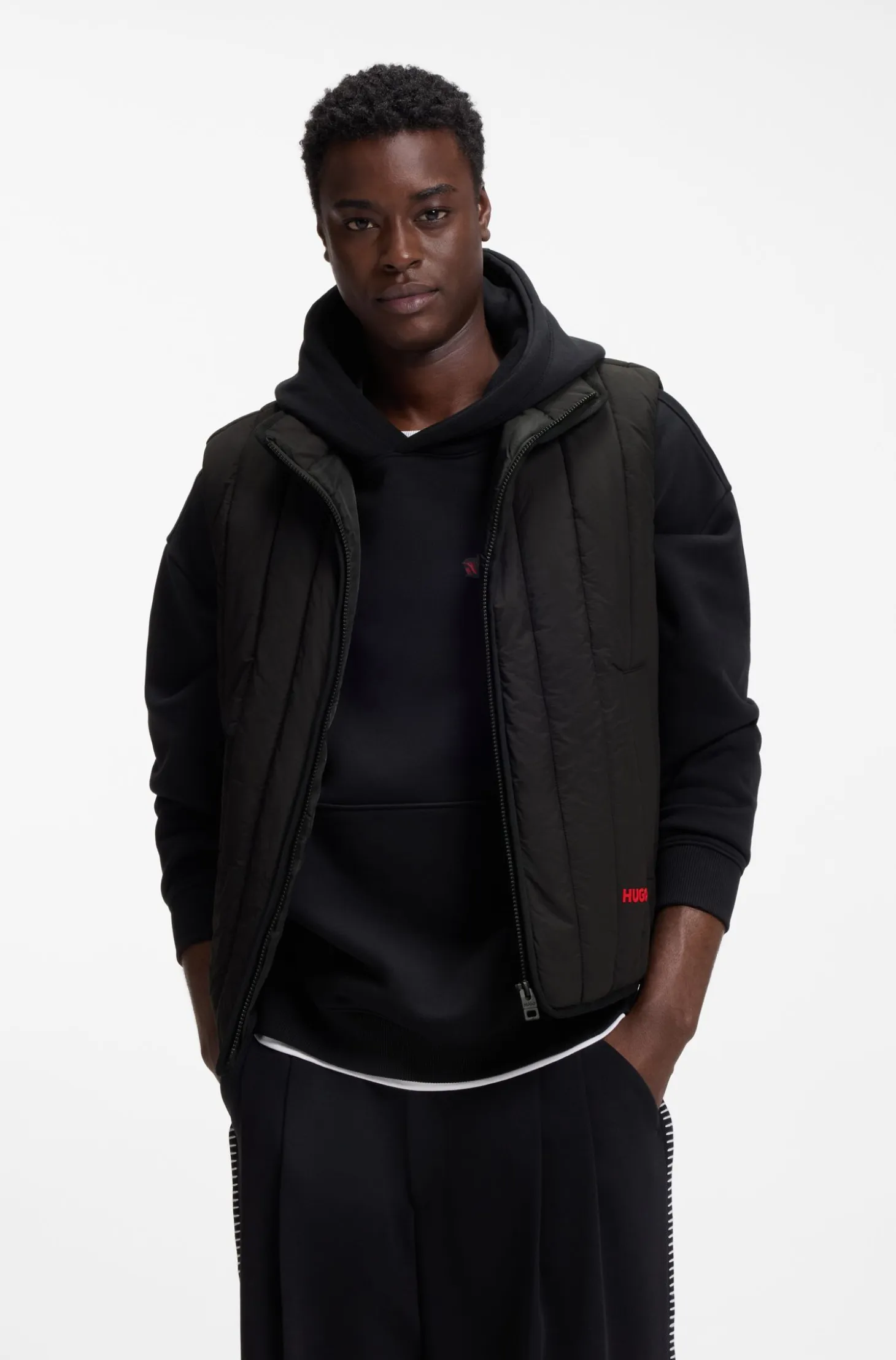 Vertical-quilted gilet with logo detail