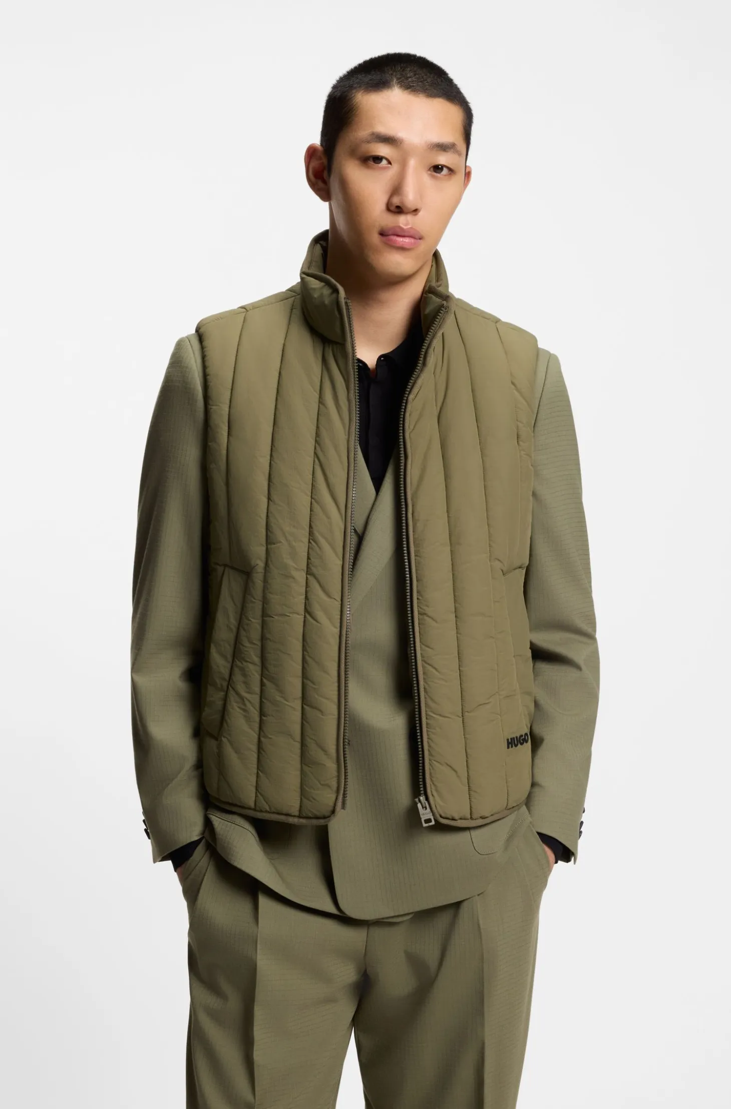 Vertical-quilted gilet with logo detail