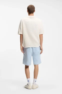 Waffle-structure knit polo with Johnny collar
