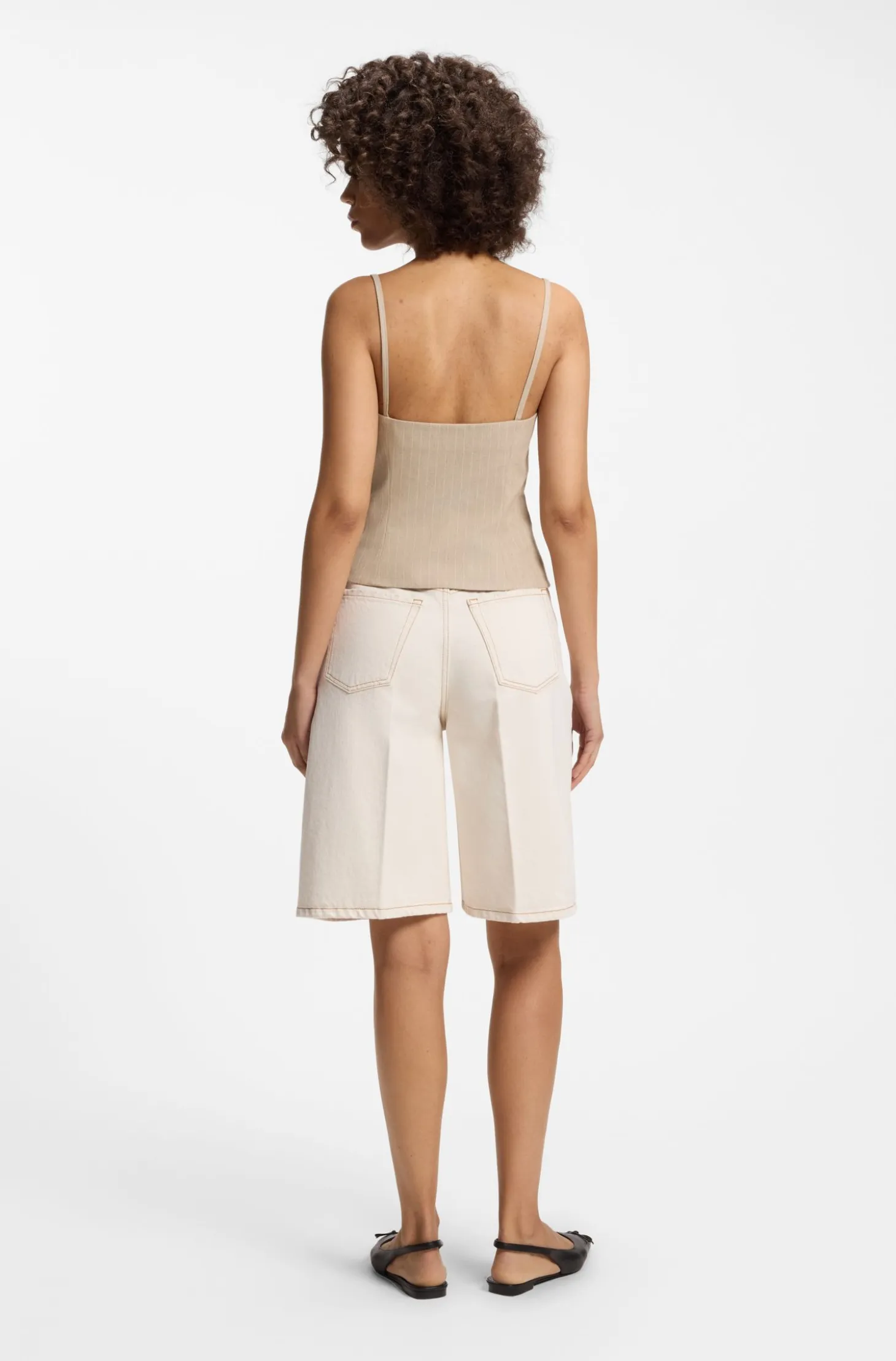Waistcoat-style slim-fit top with sparkling pinstripe
