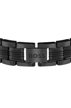 Watch-style cuff in black with engraved logo