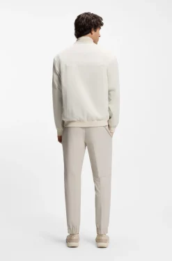Water-repellent blouson jacket with double piping