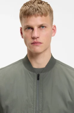 Water-repellent bomber jacket in soft-touch fabric