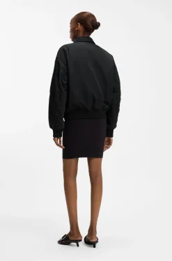 Water-repellent bomber jacket with zipped sleeve pocket