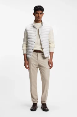 Water-repellent gilet with certified down filling