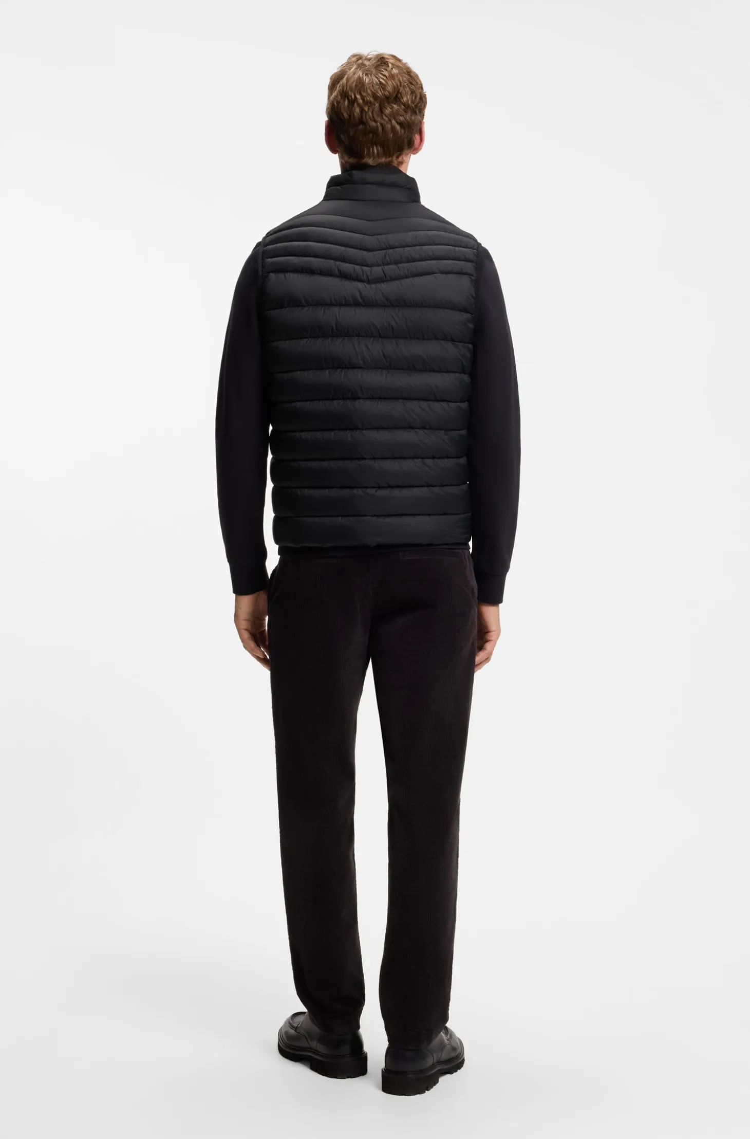 Water-repellent gilet with logo patch