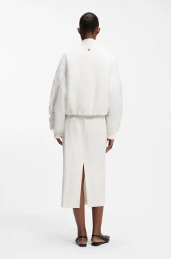 Water-repellent jacket with chiffon overlay