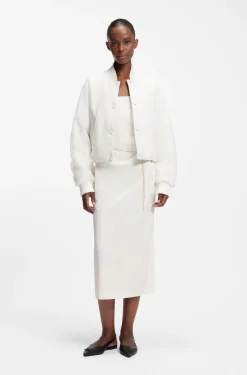 Water-repellent jacket with chiffon overlay