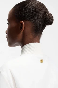 Water-repellent jacket with chiffon overlay