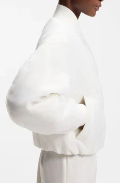 Water-repellent jacket with chiffon overlay