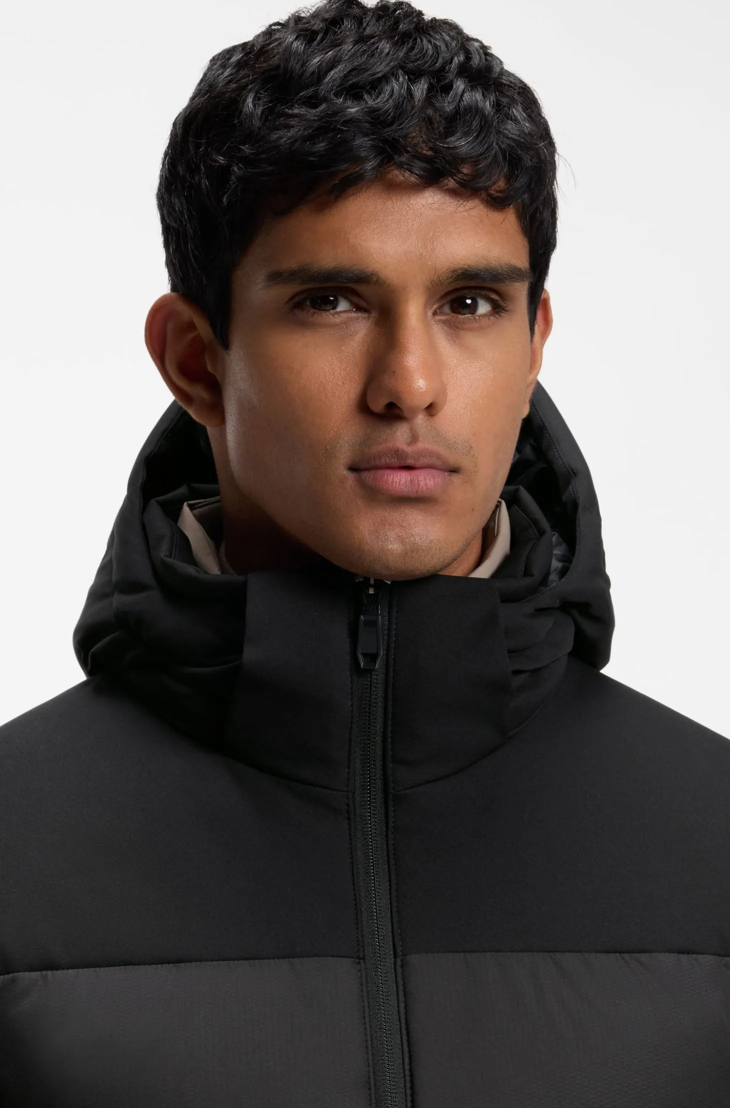 Water-repellent jacket with down filling and detachable hood