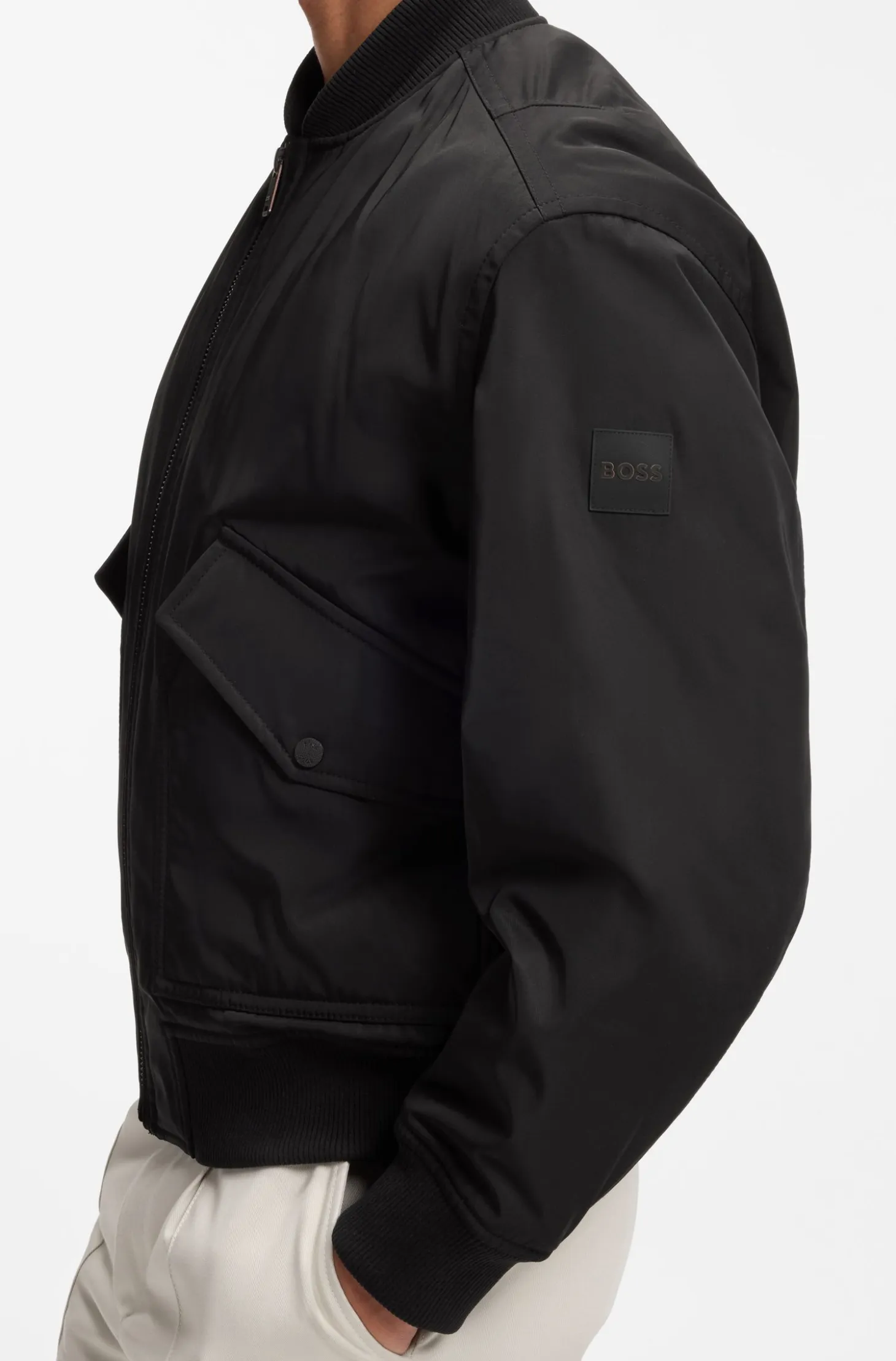 Water-repellent jacket with detachable hooded bib