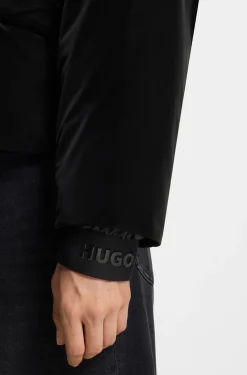 Water-repellent jacket with elasticated logo cuffs
