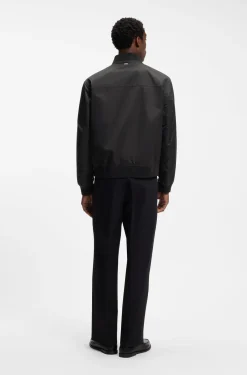 Water-repellent jacket with monogram-pattern sleeves