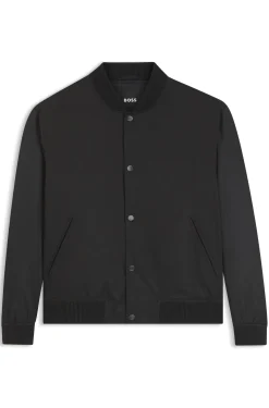Water-repellent jacket with monogram-pattern sleeves
