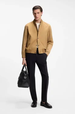 Water-repellent jacket with monogram-pattern sleeves