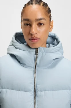 Water-repellent padded jacket with detachable sleeves and scarf