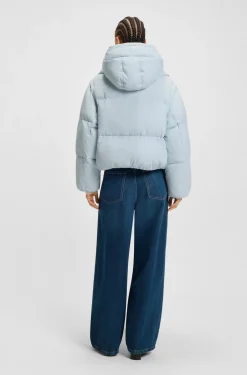 Water-repellent padded jacket with detachable sleeves and scarf