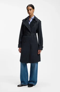 Water-repellent trench coat with buckled belt