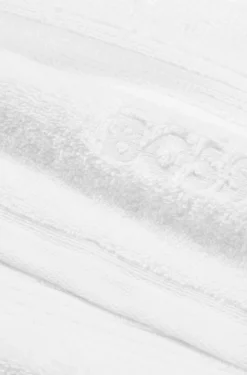 White cotton bath sheet with tonal embroidered logo