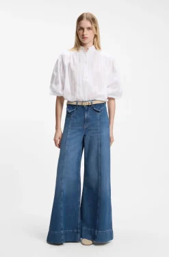 Wide-leg high-rise jeans in vintage-wash denim