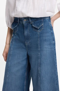 Wide-leg high-rise jeans in vintage-wash denim