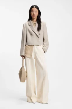 Wide-leg jeans in cream denim with front crease