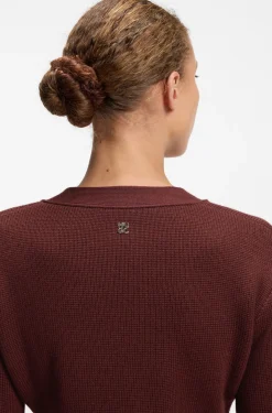 Wool-blend cardigan with logo rivet