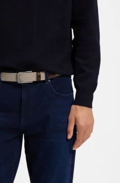Woven belt with leather facings