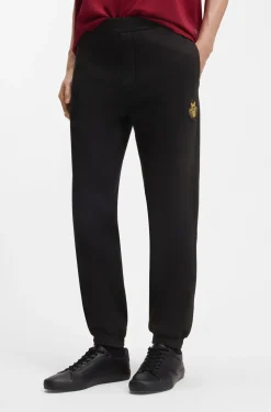 Year of the Horse Cotton-terry tracksuit bottoms with logo artwork