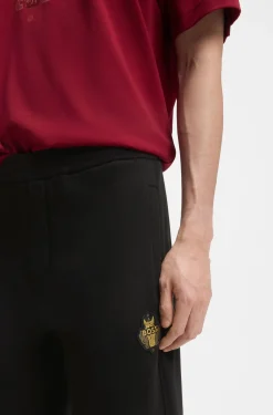 Year of the Horse Cotton-terry tracksuit bottoms with logo artwork
