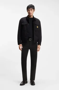Year of the Horse Tapered-fit jeans in laser-patterned black denim