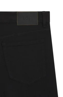 Year of the Horse Tapered-fit jeans in laser-patterned black denim