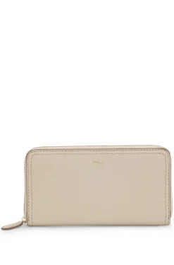Ziparound wallet in grained leather with metallic logo lettering